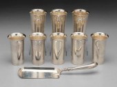 Eight sterling tumblers, flare