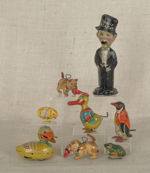 Eight tin litho wind-up toys 20th