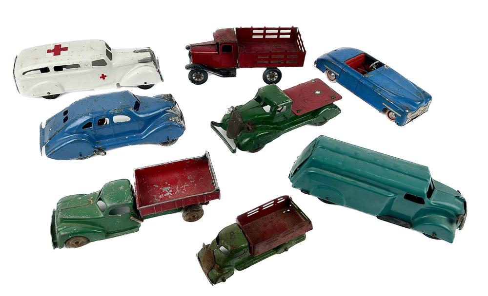 EIGHT TOY CARS AND TRUCKS 20TH