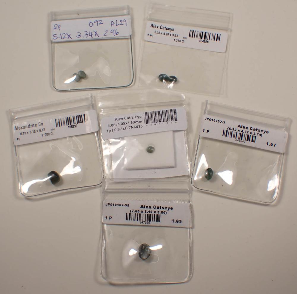 EIGHT UNSET ALEXANDRITE CAT'S EYE