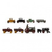 EIGHT VINTAGE CAST IRON VEHICL