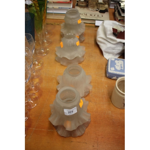 Eight vintage frosted glass shades,