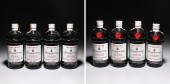 Eight vintage Tanqueray bottle