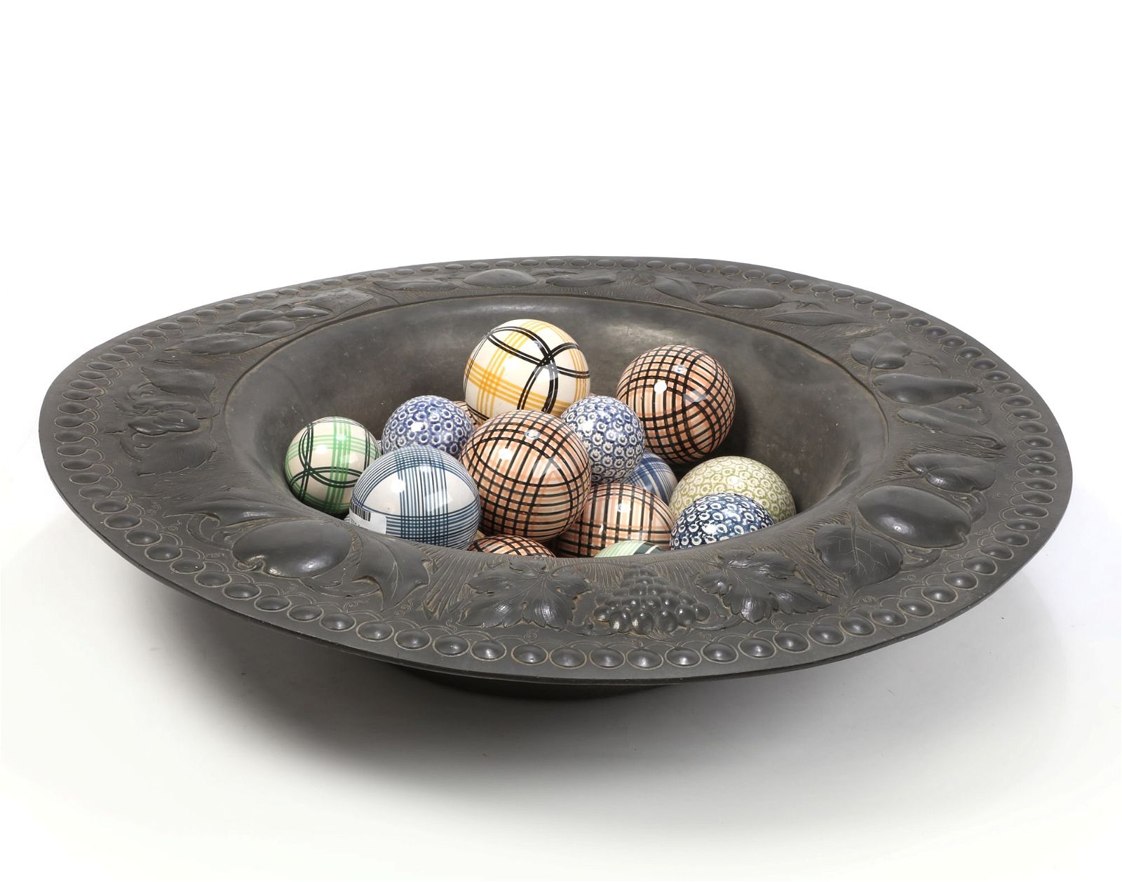 EIGHTEEN CARPET BALLS IN A COPPER