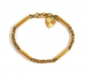 EIGHTEEN KARAT GOLD CHAIN BRAC