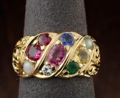 EIGHTEEN KARAT GOLD RING WITH