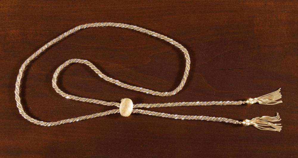 EIGHTEEN KARAT GOLD SLIDE TASSEL