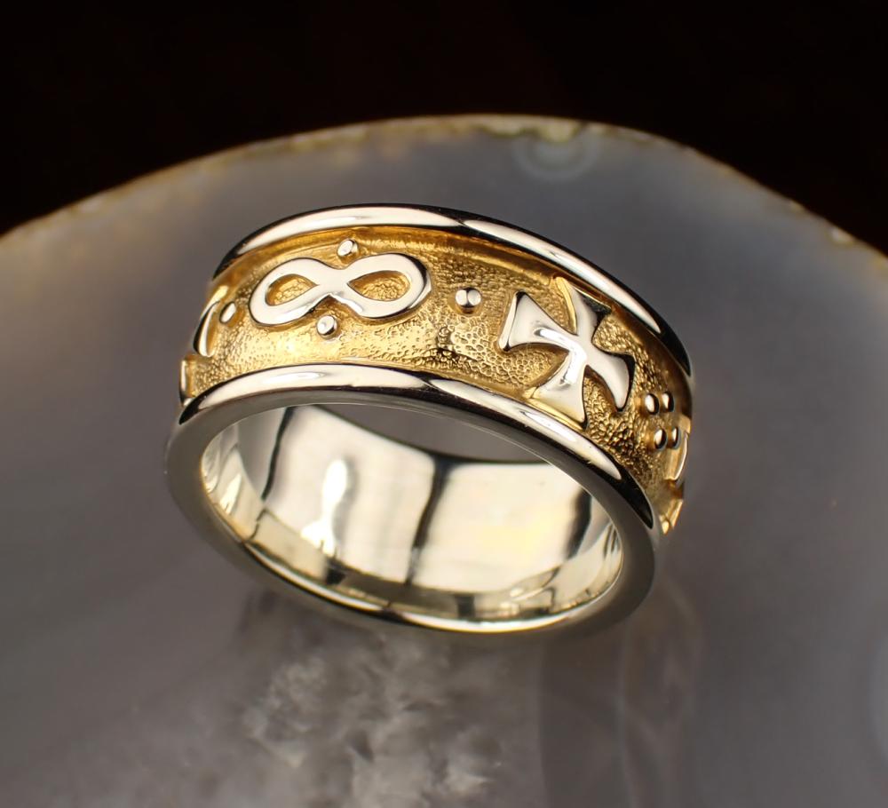 EIGHTEEN KARAT TWO-TONE GOLD