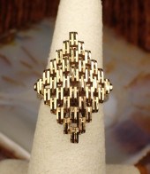 EIGHTEEN KARAT YELLOW GOLD RIN