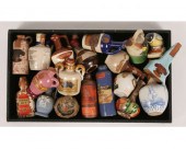 Eighteen miniature bottles of