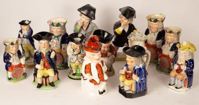 Eighteen Toby jugs, the largest
