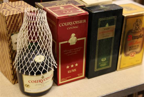 Eights bottles of mostly cognac