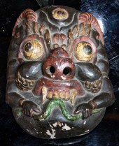 ELABORATELY CARVED AND PAINTED