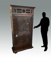 ELABORATELY CARVED FIGURAL WIN