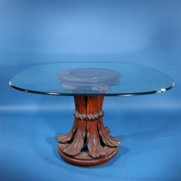 Elaborately carved wood base with