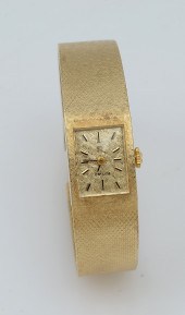 ELEGANT LADIES 14K OMEGA WRIST