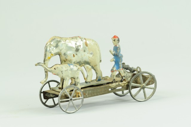 ELEPHANT WITH FIGURE ON PLATFORM