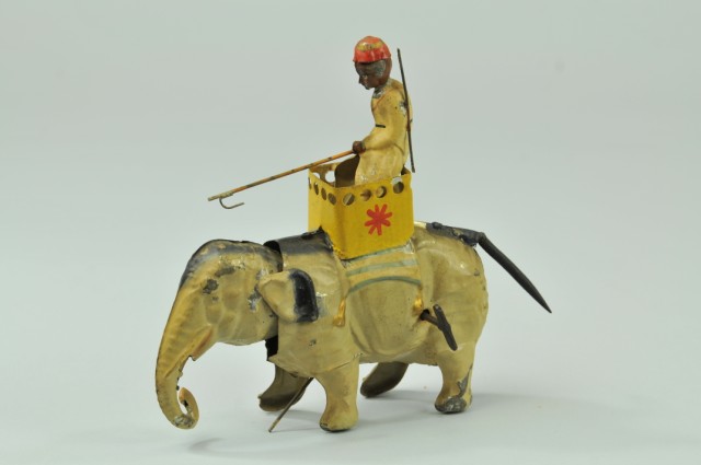 ELEPHANT WITH RIDER IN HOWDAH