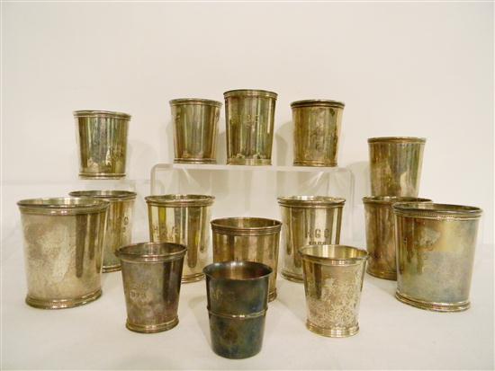 Eleven 3 1/2'' sterling mugs 