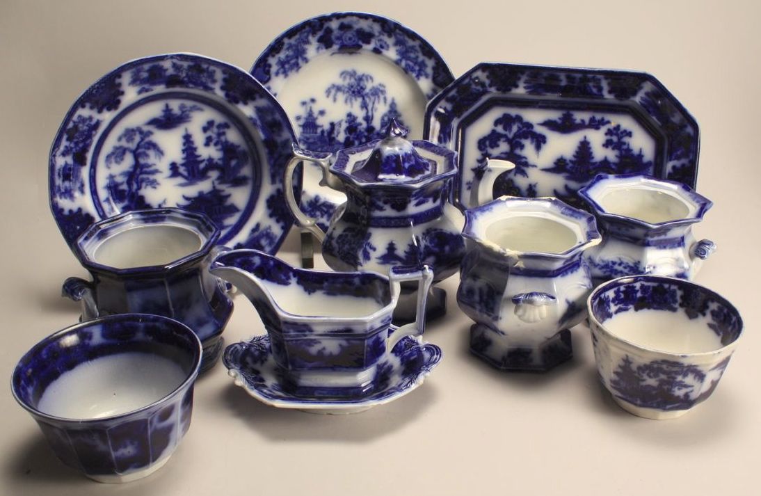 ELEVEN ASSORTED PIECES OF FLOW BLUE