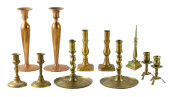 ELEVEN BRASS CANDLESTICKS, FIV