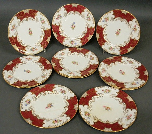 Eleven Coalport service plates with