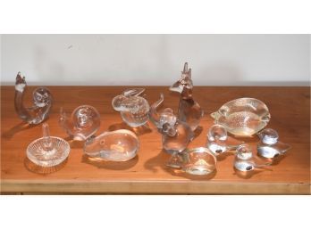 Eleven glass figural ornaments by