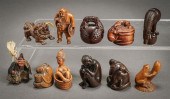 ELEVEN JAPANESE CARVED NATURAL