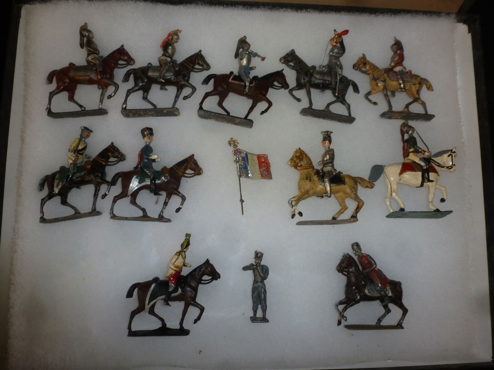 ELEVEN MOUNTED PRE WW II BRITAINS