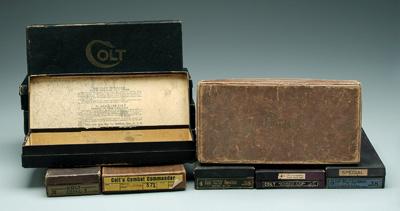 Eleven old Colt revolver boxes: