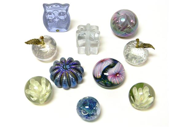 Eleven paperweights: two