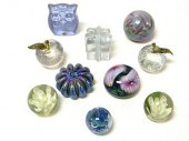 Eleven paperweights: two trans