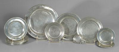 Eleven pewter plates, porringer: