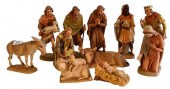 ELEVEN PIECE GROUP OF CARVED A