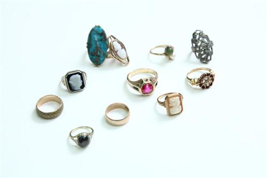 ELEVEN RINGS. One ''18K'' band 