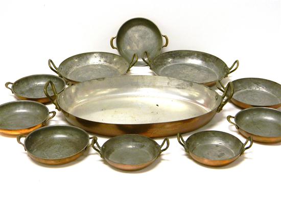 Eleven Saute copper pans: ten round
