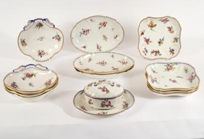 Eleven Sèvres dessert dishes and an
