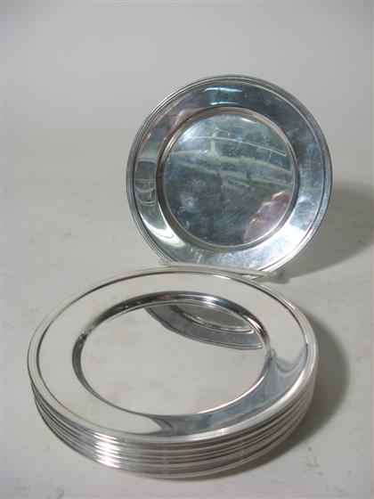 Eleven sterling silver bread plates