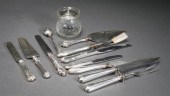 ELEVEN STERLING SILVER HANDLE