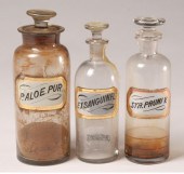 Eleven stoppered glass pharmac