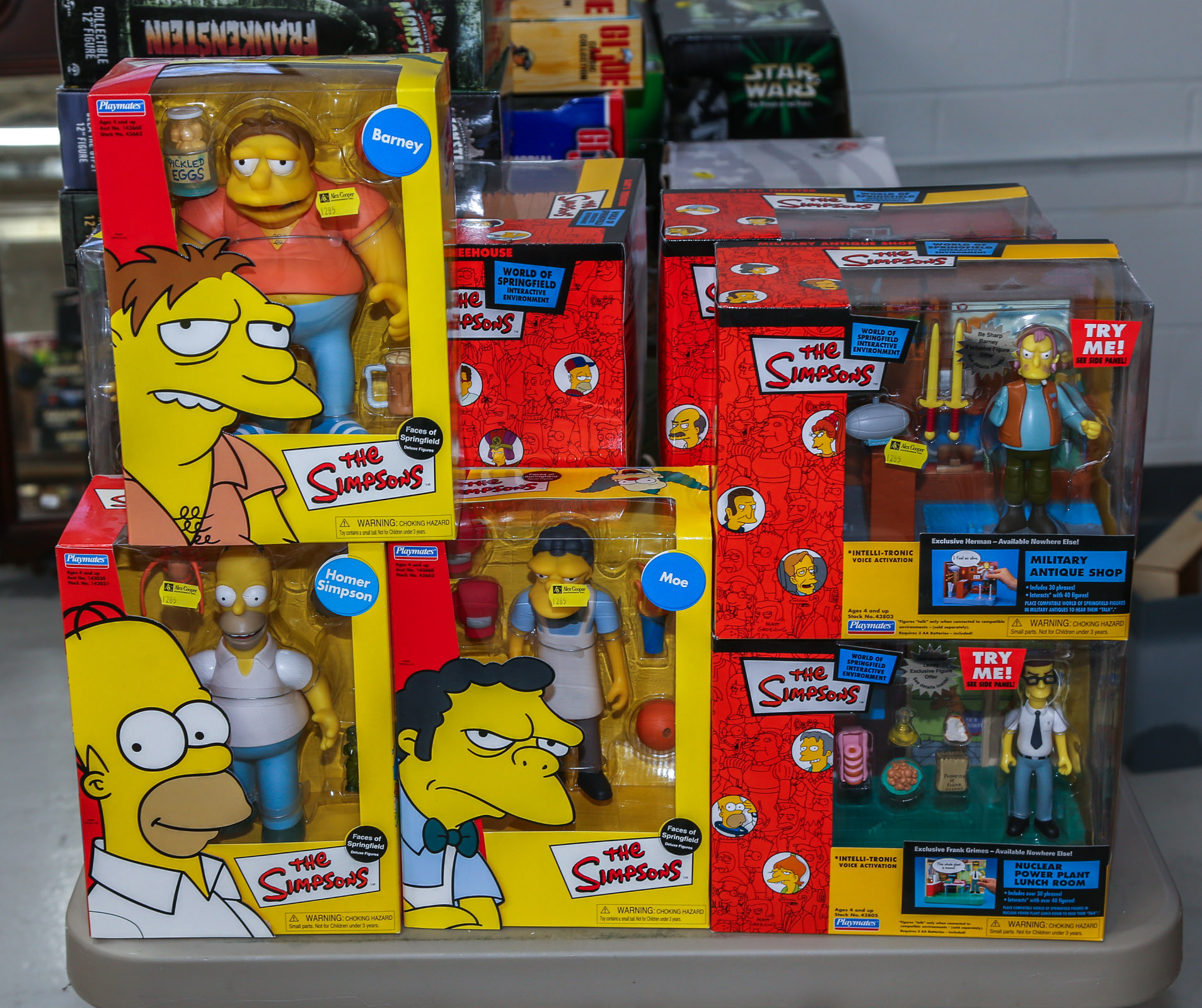 ELEVEN "THE SIMPSONS" FIGURINES &