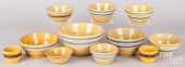 ELEVEN YELLOWWARE BOWLS, 19TH