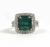 EMERALD AND DIAMONDS RING WITH