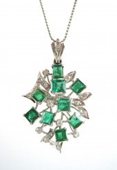 EMERALD AND EIGHTEEN KARAT GOL
