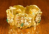 EMERALD AND EIGHTEEN KARAT GOL