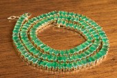 EMERALD AND FOURTEEN KARAT GOL