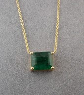 EMERALD AND FOURTEEN KARAT GOL