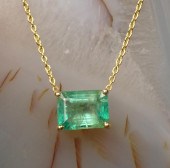 EMERALD AND FOURTEEN KARAT GOL