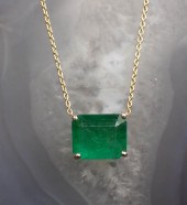 EMERALD AND FOURTEEN KARAT GOL