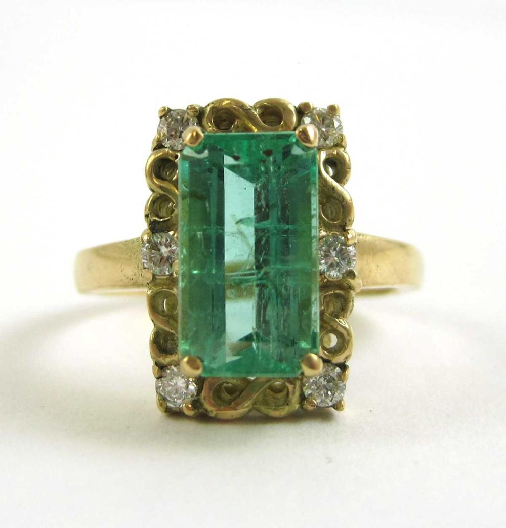 EMERALD, DIAMOND AND FOURTEEN KARAT